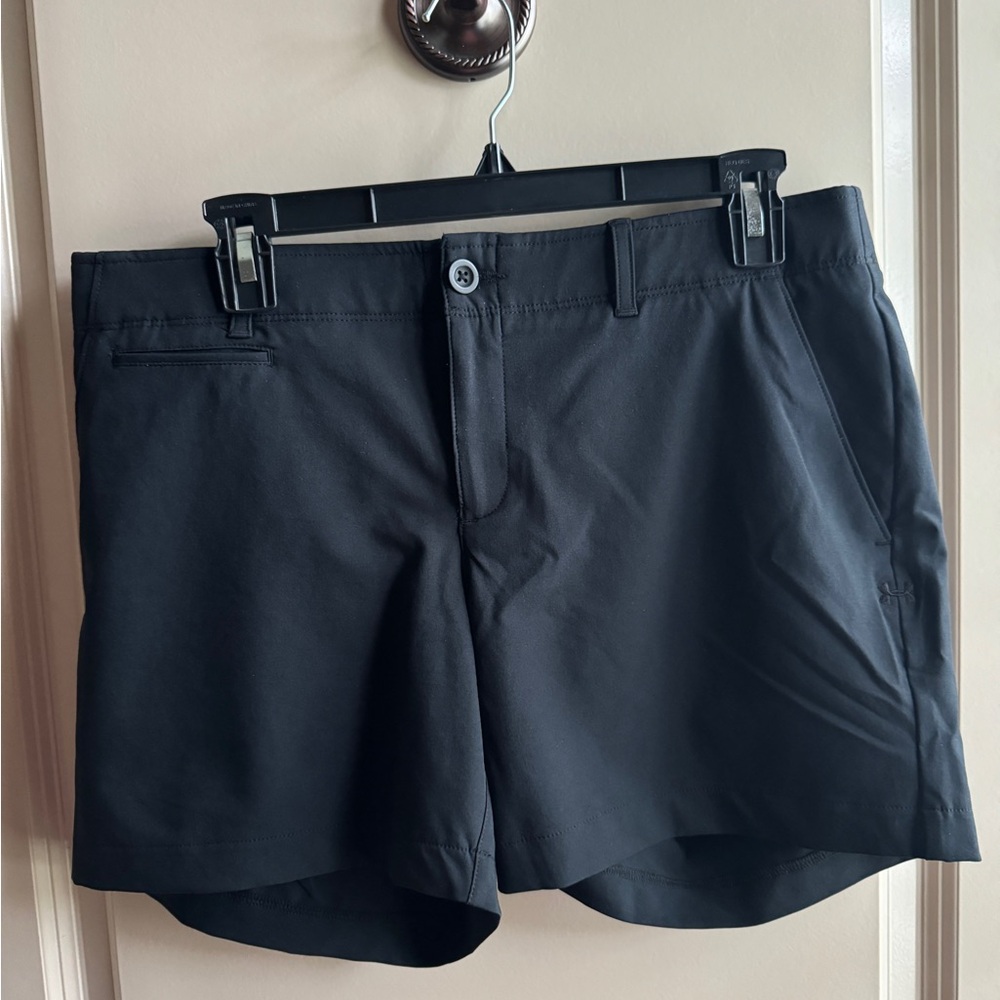 Under Armour performance shorts. Never worn!